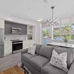 Boutique 1130sqft Stockyard Condo with Parking