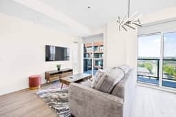 Sun Kissed Condo with Terrace & Free Parking - Image 3