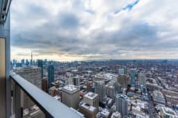 Luxury 1BR + Den Suite - Balcony & City Views - Image 5