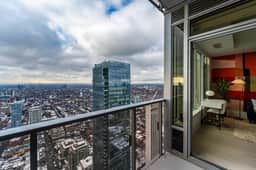 Luxury 1BR + Den Suite - Balcony & City Views - Image 4