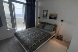 Modern 2BR Haven | City Views - Image 4