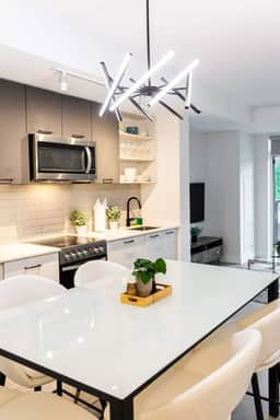 Chic 2BR Condo with Terrace & Parking - Image 5
