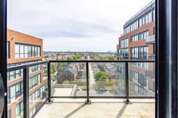Elegant 4BR Condo with City Views & Free Parking - Image 5