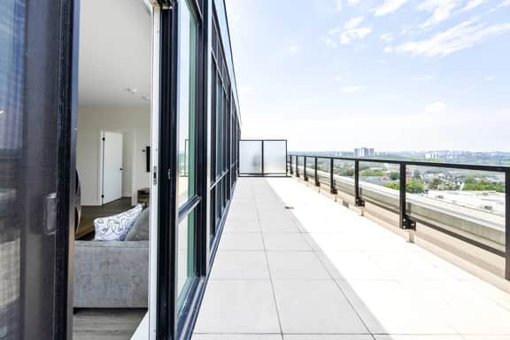 Chic 3BR Loft • Massive Patio • City Views - Image 5
