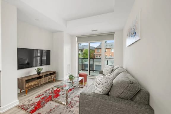 Chic 2BR Condo with Terrace & Parking - Image 1
