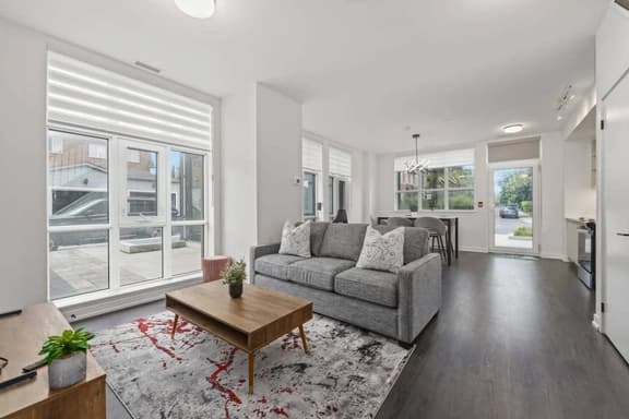 Spacious 2BR Townhouse w/ Parking & Workspace - Image 1
