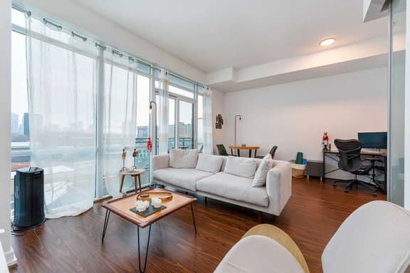 Modern 1BR + Den Condo with Sauna Access - Image 1